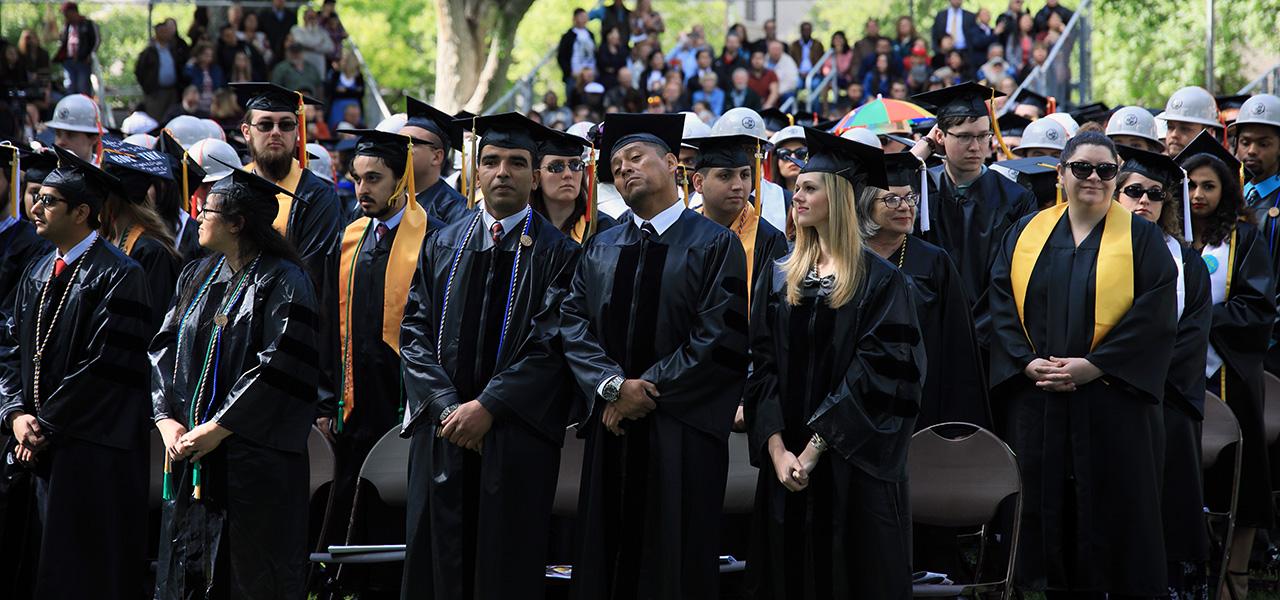 Hero Image of students standing at graduation.
